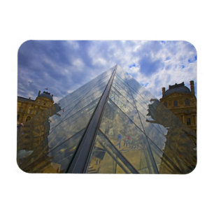France, Paris. Clouds reflect off the Louvre Magnet