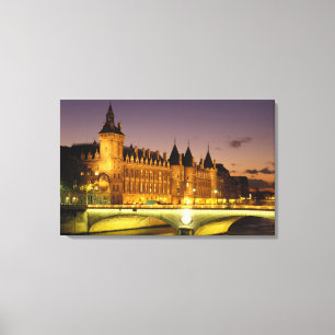 France, Paris, Conciergerie and river Seine at Canvas Print