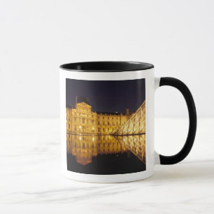 France, Paris, Louvre museum by night. Mug