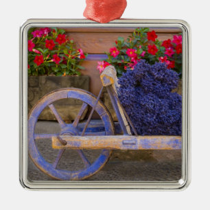 France, Provence, Sault. Old wooden cart with Metal Tree Decoration