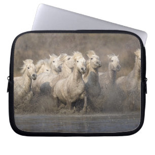 France, Provence. White Camargue horses running Laptop Sleeve