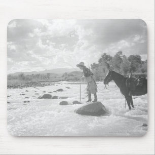 Frances Phelps Belden fly fishing in the river Mouse Mat