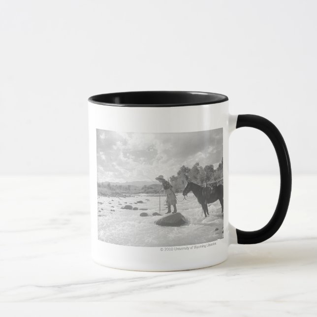 Frances Phelps Belden fly fishing in the river Mug (Right)
