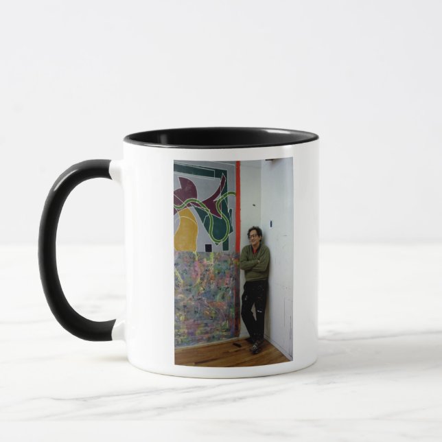 Frank Stella  beside one of his works Mug (Left)