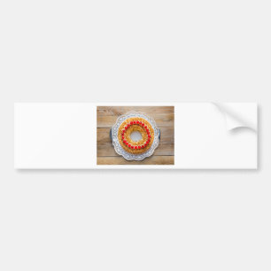 Frankfurt crown cake with cherries on rustic wood bumper sticker