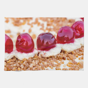 Frankfurt crown cake with cherries on rustic wood tea towel