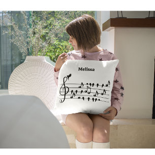 Free as a bird, song birds acting as musical notes cushion