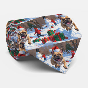 French Bulldog Running in Snow with Christmas Hat Tie