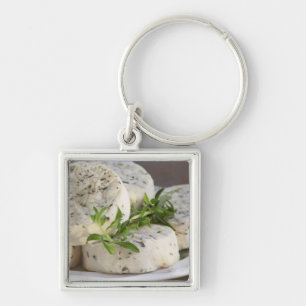 French goat cheese - chevre - with herbs on a key ring
