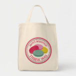 French Macarons Merci Beaucoup Thank You Tote Bag<br><div class="desc">A grocery tote featuring an illustration of four French macarons (purple,  blue,  pink,  and yellow) inside a decorative pink and blue circle with pink text that says "Merci Beaucoup" and "Thank You."</div>