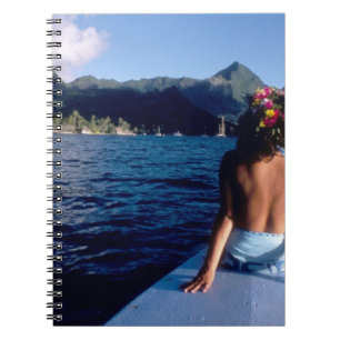 French Polynesia, Moorea. Woman enjoying view on Notebook