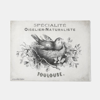French vintage style doormat with bird in nest.