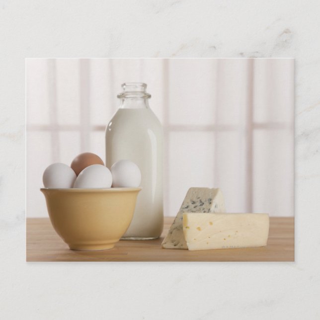 Fresh eggs cheese and milk on counter postcard (Front)