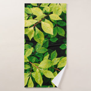 fresh green leaves look beautiful and very natural bath towel
