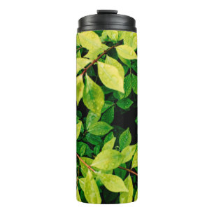 fresh green leaves look beautiful and very natural thermal tumbler