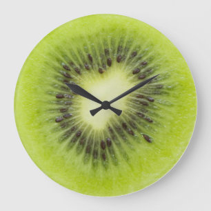 Fresh kiwi fruit. Round slice closeup isolated Large Clock