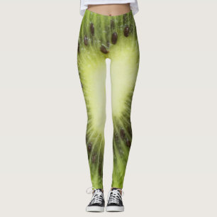 Fresh kiwi fruit. Round slice closeup isolated Leggings