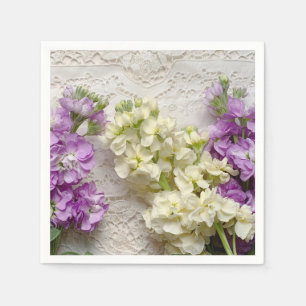 Fresh lilacs on old lace napkin