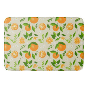 Fresh oranges with flowers and leaves bath mat