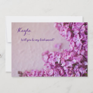 Fresh purple lilacs on texture invitation
