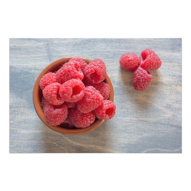 Fresh raspberries in a bowl photo print (Front)