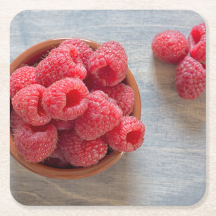 Fresh raspberries in a bowl square paper coaster