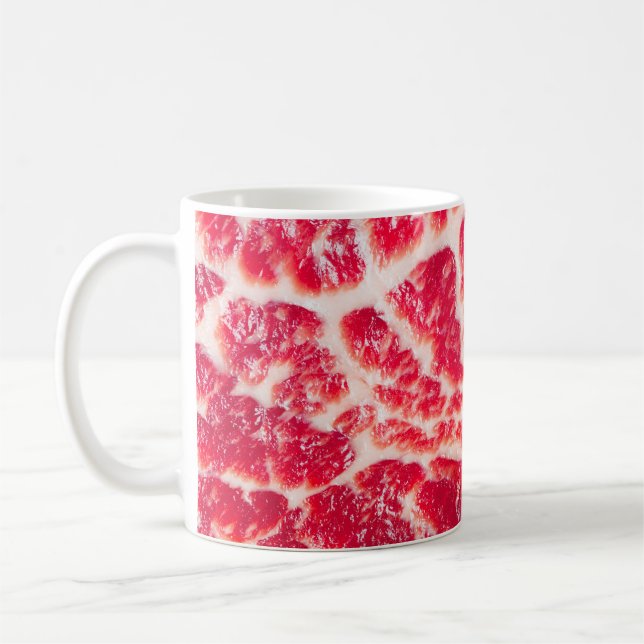 Fresh raw beef steak marbled meat texture close up coffee mug (Left)