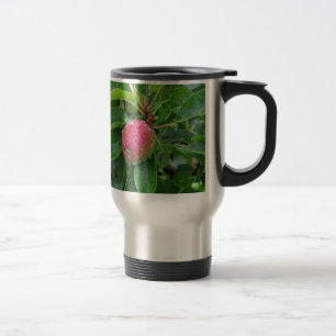 Fresh red apple on tree travel mug