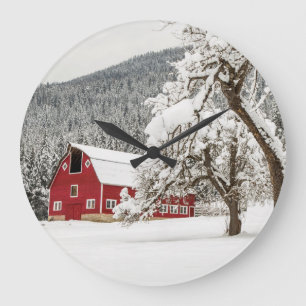 Fresh snow on red barn large clock