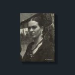 Frida Kahlo in Black Canvas Print<br><div class="desc">Frida Kahlo de Rivera was a Mexican Painter remembered for her intense and vibrant works. Her work has been celebrated in Mexico as emblematic of national and indigenous tradition, and by feminists for its uncompromising depiction of the female experience and form. Visit www.fridakahlo.com for more information about her life, works,...</div>