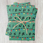FRIENDS™ | Christmas Lights Logo Wrapping Paper Sheet<br><div class="desc">Celebrate the holiday season with the FRIENDS™ Christmas Lights Logo Design. Featuring the iconic FRIENDS™ logo adorned with colorful Christmas lights, this festive design adds charm and nostalgia to a variety of products. Perfect for fans of the beloved TV show, it’s a delightful way to bring holiday cheer to gifts,...</div>