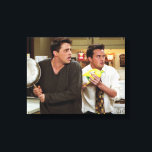 FRIENDS™ | Joey & Chandler Scared Canvas Print<br><div class="desc">Capture the hilarious antics of FRIENDS™ with the Joey and Chandler Scared Design. This playful design showcases Joey and Chandler in one of their classic scared moments, highlighting the humour and charm that made the duo unforgettable. Perfect for fans, it adds a nostalgic and comedic touch to any product.</div>