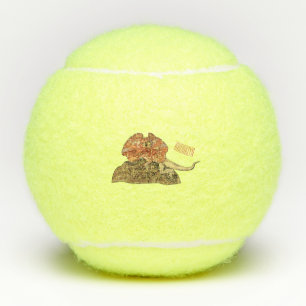 Frilled-neck lizard cartoon illustration tennis balls