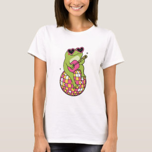 Frog sitting on dance ball playing guitar T-Shirt