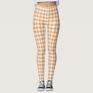 Front and back view of leggings with brown