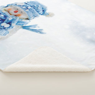 Frosty friend in blue sherpa blanket