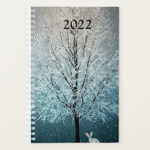 Frosty tree in the evening planner