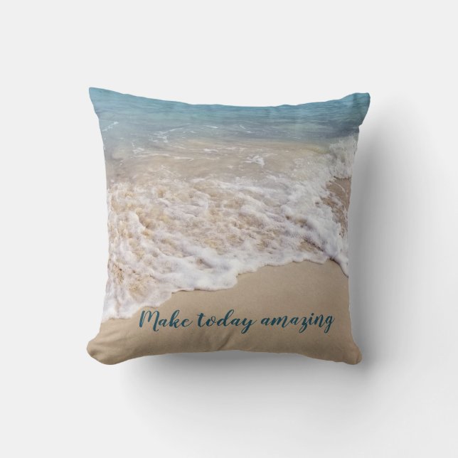 frothy sea foam on beach with quote cushion (Front)