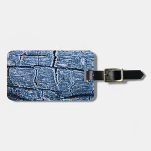 Frozen burnt wood luggage tag