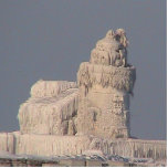Frozen Cleveland Lighthouse Standing Photo Sculpture<br><div class="desc">December 2010, for about two and a half weeks, the lighthouse in Cleveland Harbour was completely frozen over, forming a 78 foot tall ice sculture. Interesting because this made world news, as a bizarre sight in Cleveland Harbour, The light is automated and this year ( 2011) marks 100 years this...</div>