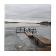 Frozen lake with a dock