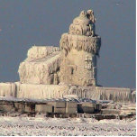 Frozen Lighthouse, Cleveland Standing Photo Sculpture<br><div class="desc">December 2010,  the lighthouse in Cleveland Harbour froze- this is a memory of that moment. Rare occasion caught in a photo and now in sculpture.</div>