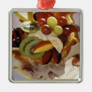 Fruit salad with ice cream. metal tree decoration