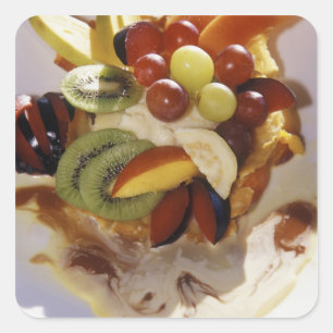 Fruit salad with ice cream. square sticker