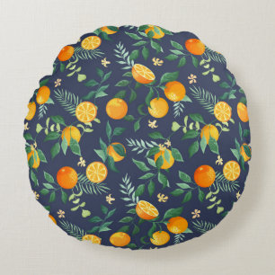 Fruits oranges with tropical leaves and flowers on round cushion