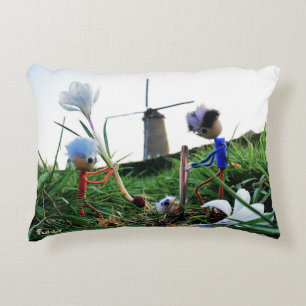 Fubbies in a mill plant a crown ball. decorative cushion