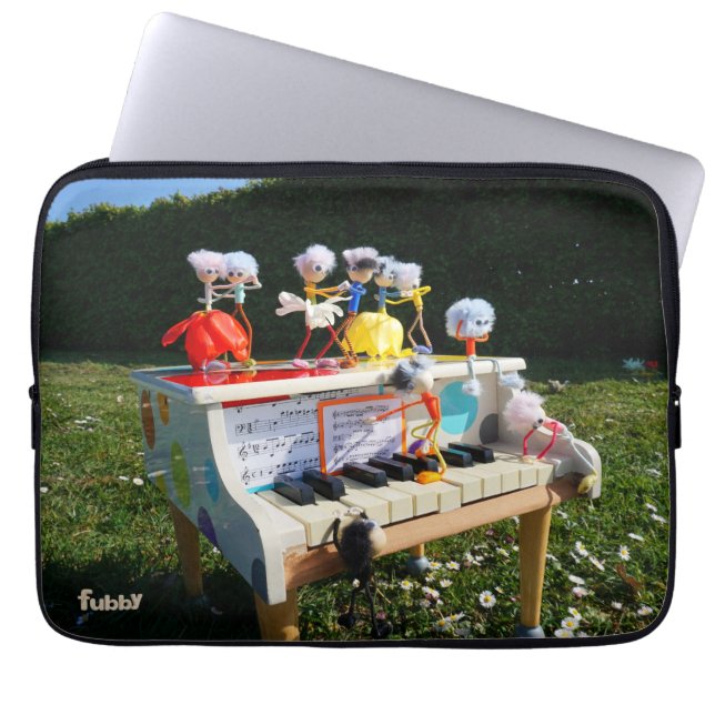 Fubbies on the piano making and dancing music. laptop sleeve (Front)