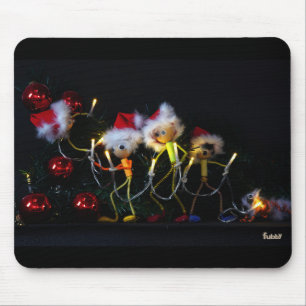 Fubby is hanging the Christmas lights in the Chris Mouse Mat