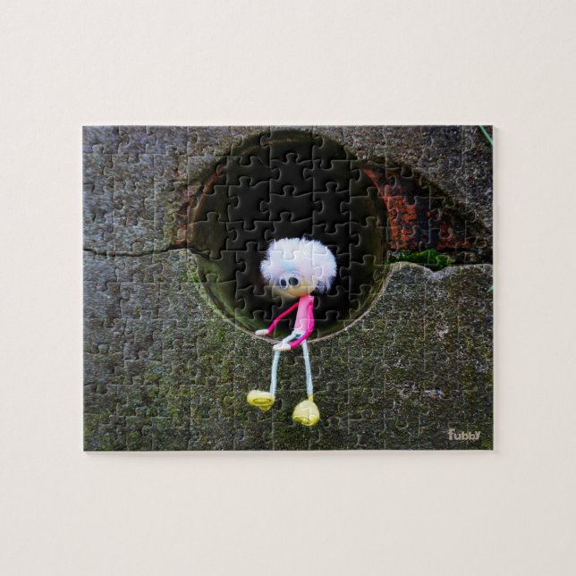 Fubby puppetry sitting in a wall. A cute man Jigsaw Puzzle (Horizontal)