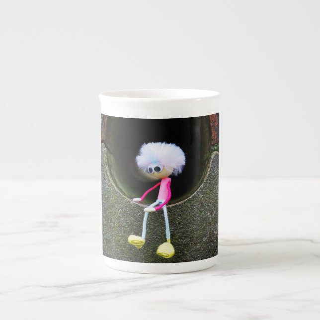 Fubby puppetry sitting in a wall. bone china mug (Front)